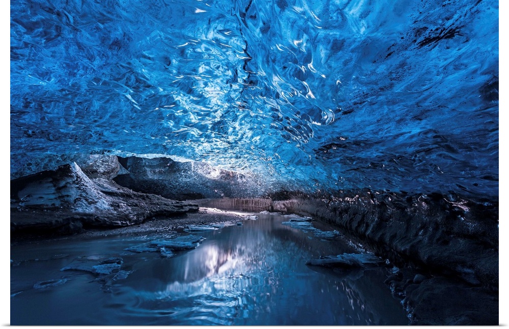 A view of the ceiling of an ice cave from inside it, Iceland.
