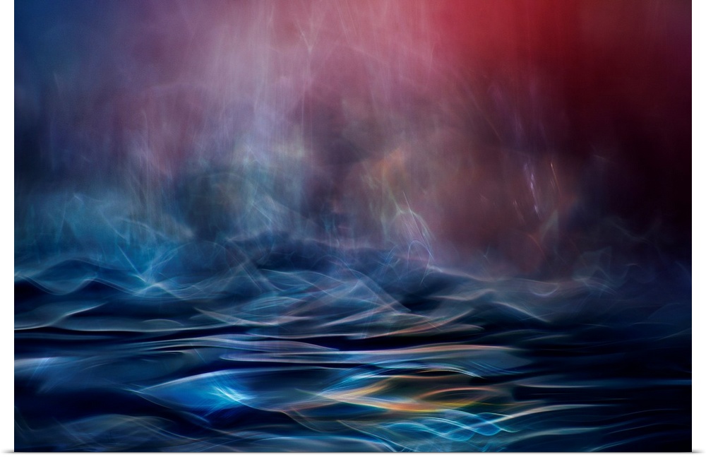 Abstract image made of blurred light and color, resembling an ocean in the evening.