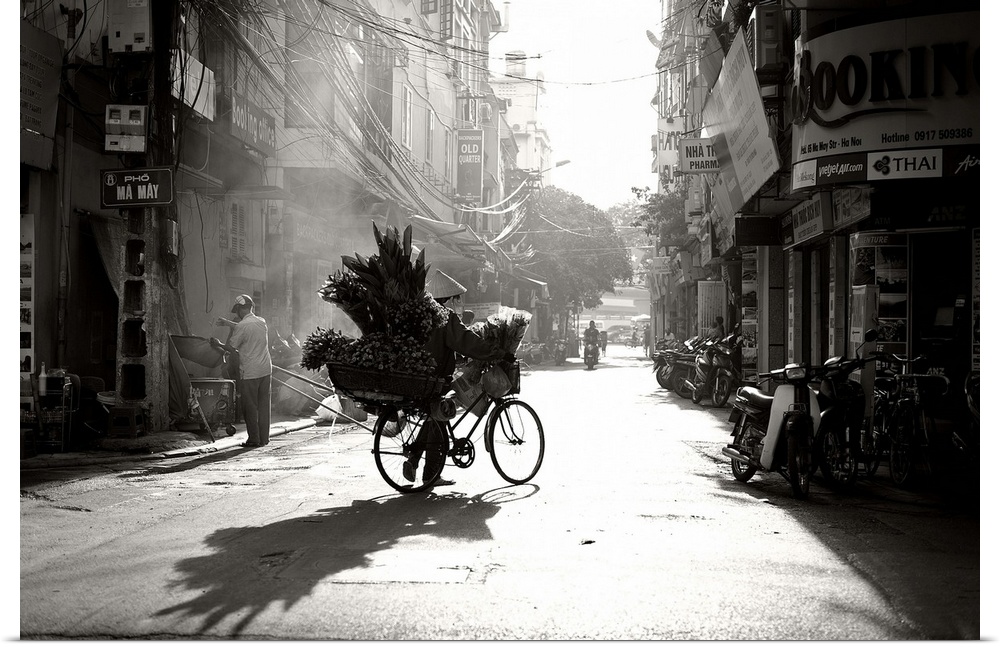 An early morning in the streets of a city in Vietnam.