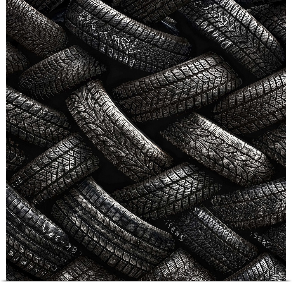 A stack of tires almost resembling intricate braids.