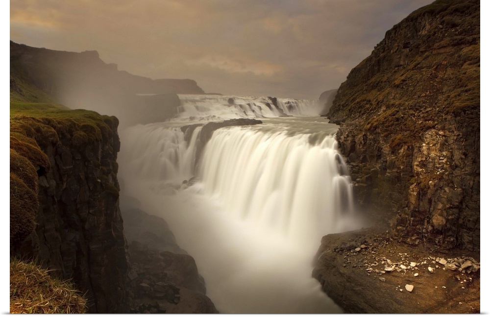 A view of the beautiful Gullfoss Waterfall in the mountains of Iceland.