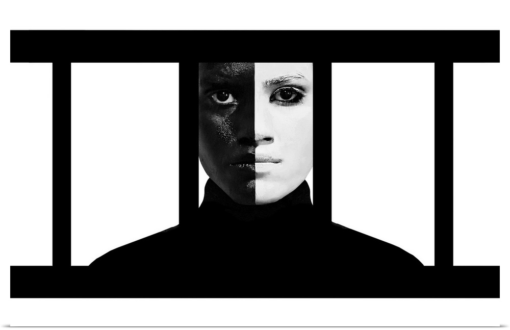 A woman wearing makeup making her face exactly half black and half white, behind vertical bars.