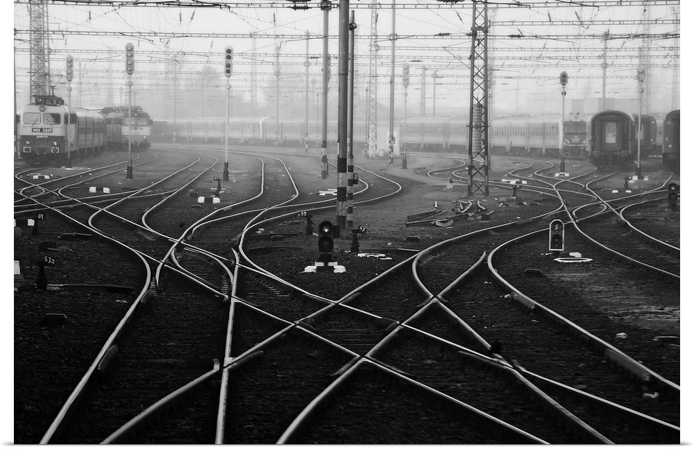 Criss-crossing rail lines and wires at a train station in Budapest.