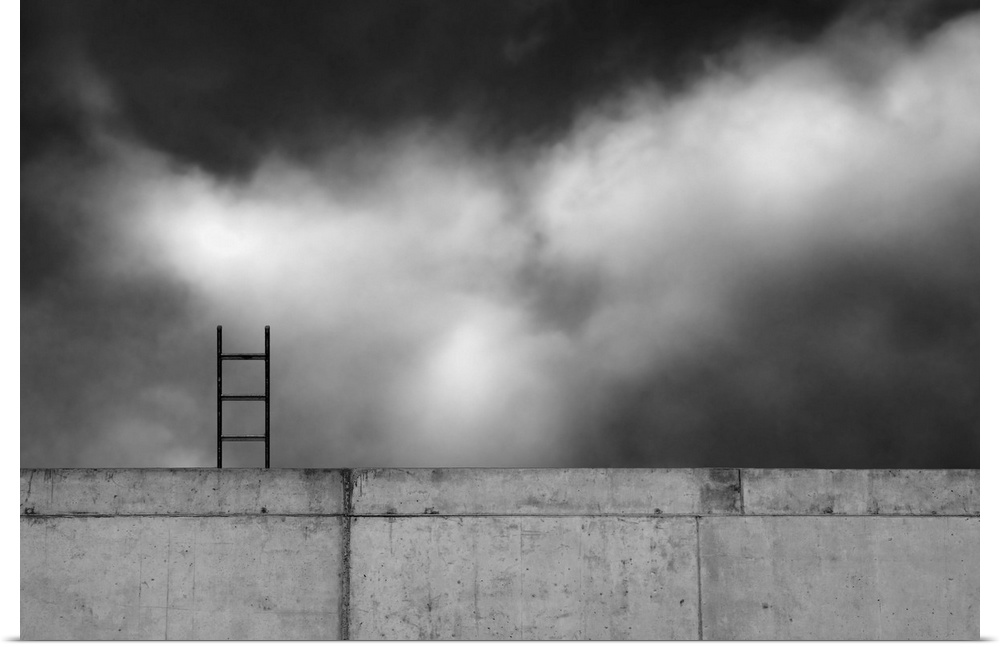 The top of a ladder visible above a concrete wall, with a cloudy sky.