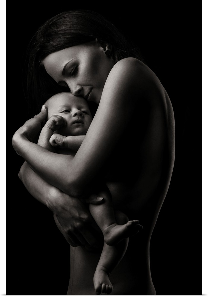 A fine art photograph of a woman holding her infant child lovingly.