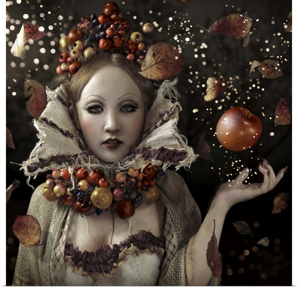 Conceptual image of a woman with a crown and collar of autumn fruit, representing the harvest.