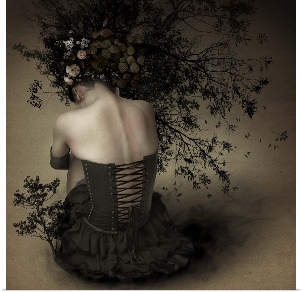 Conceptual image of a woman with branches and flowers in her hair.