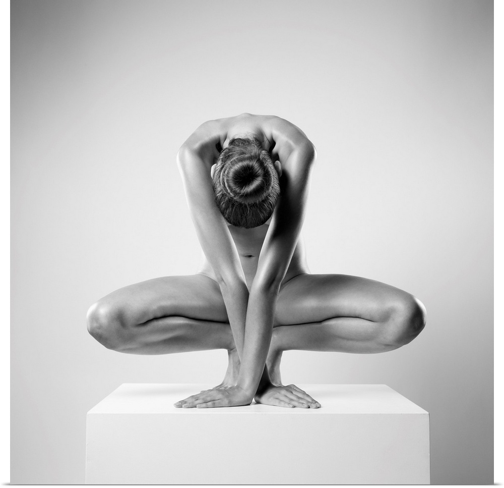 Square high key fine art photograph of a nude woman posing as a sculpture and creating symmetry.