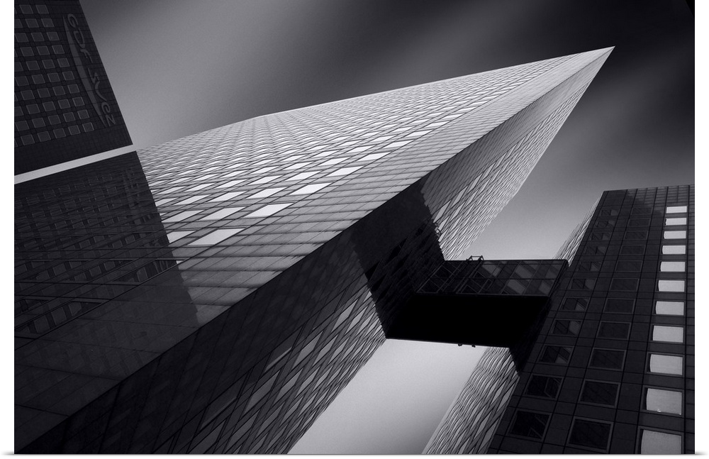 An abstract photograph of a skyscraper from below.