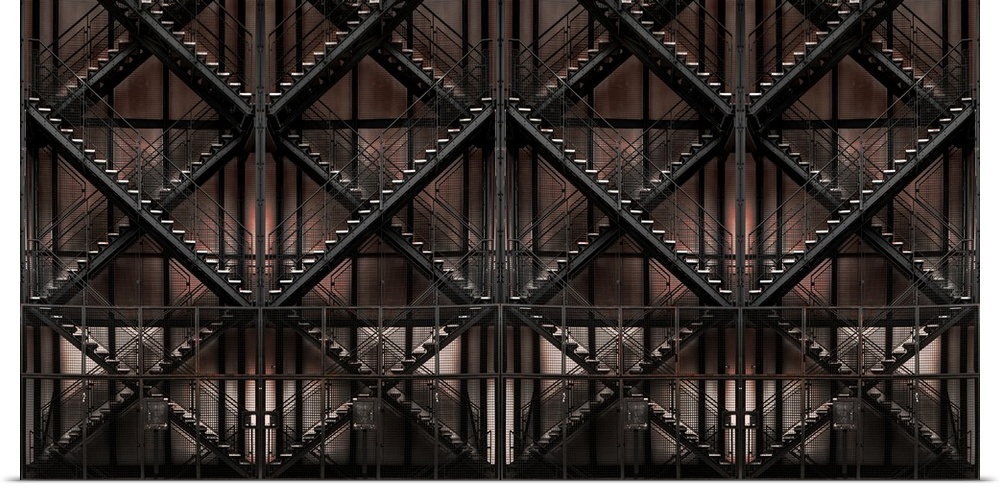 Architectural abstract photograph of crossing staircases creating a pattern.