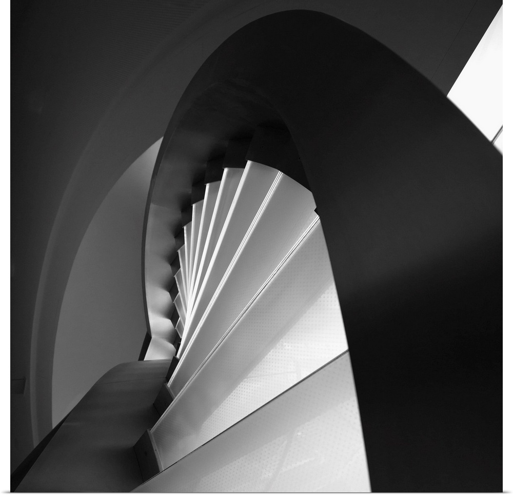 A black and white photograph of an abstract view of architectural design.