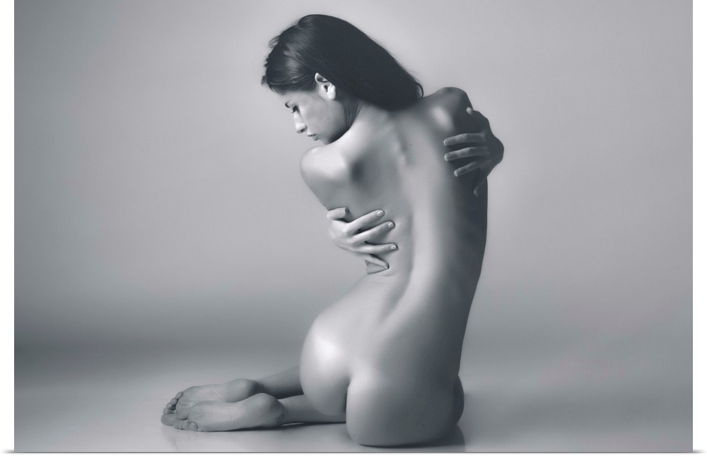 A photograph of a nude female study.