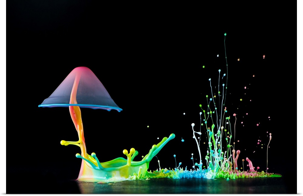 A macro photograph of a colorful tiny splash of water resembling a mushroom.