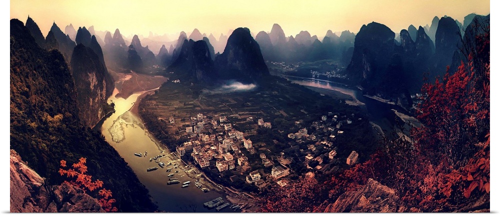 A dynamic and intense photograph of a view of the Karst mountains in Guangxi, China.