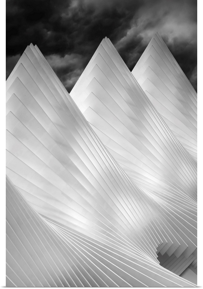 A black and white photograph of conical architectural attributes.