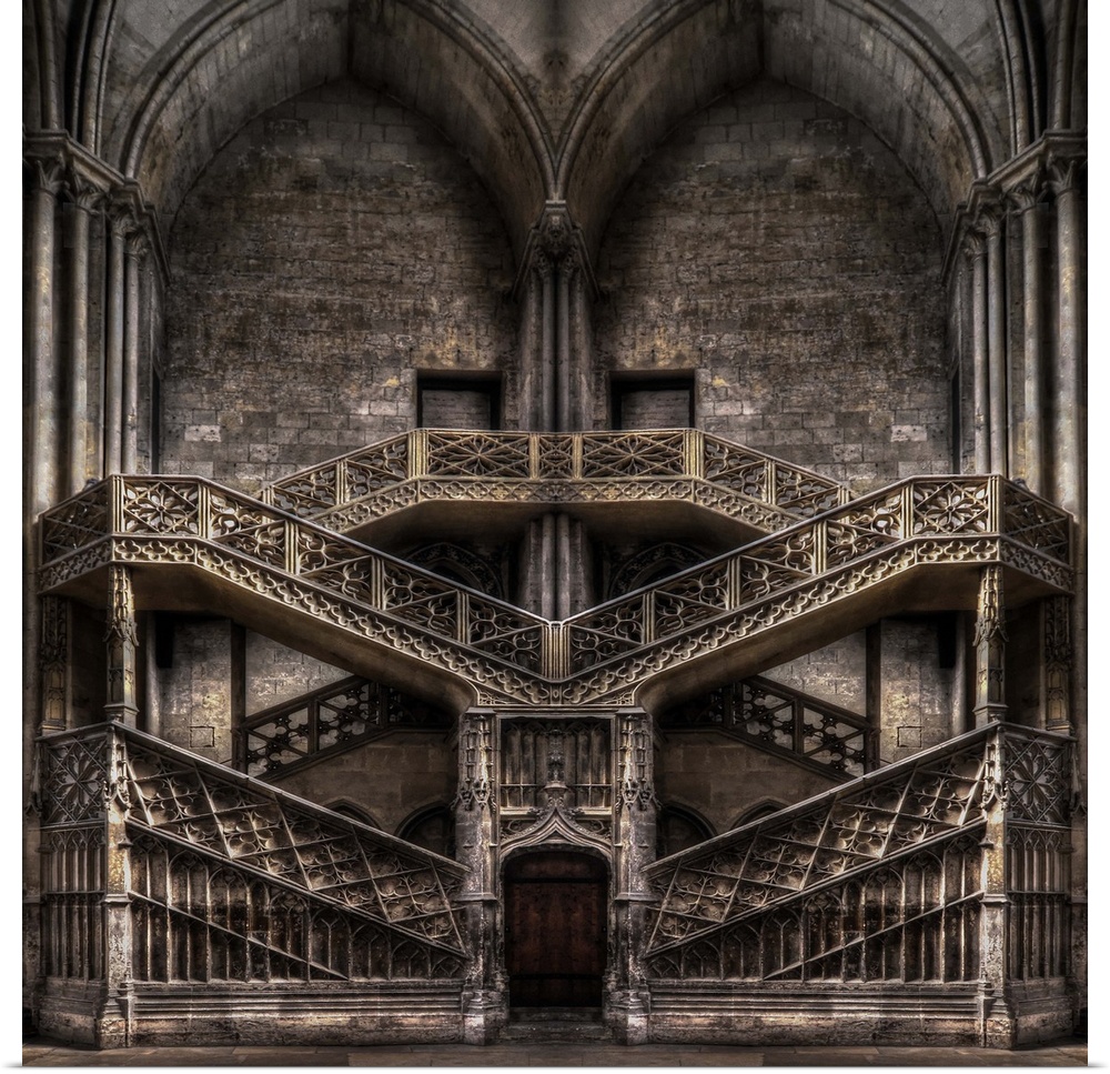 Symmetrical image of an elaborate and ornate set of twin staircases.
