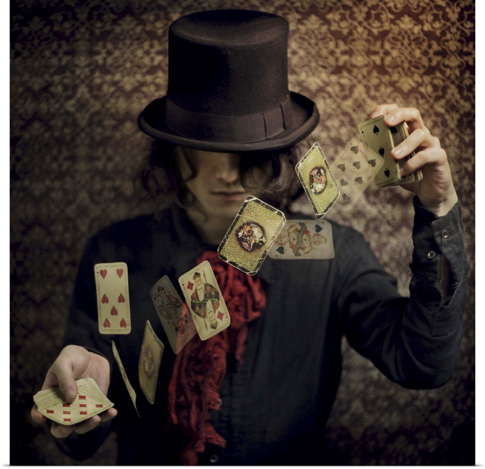 Conceptual image of a magician flipping playing cards in the air.