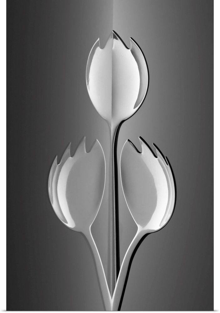 Three sporks arranged to resemble three tulips.