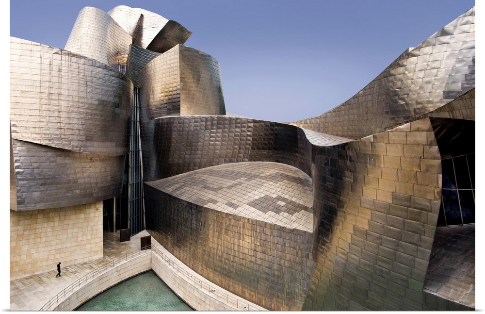 The impressive curves of the titanium and glass walls of the Guggenheim Museum in Bilbao, Spain, designed by Frank Gehry.