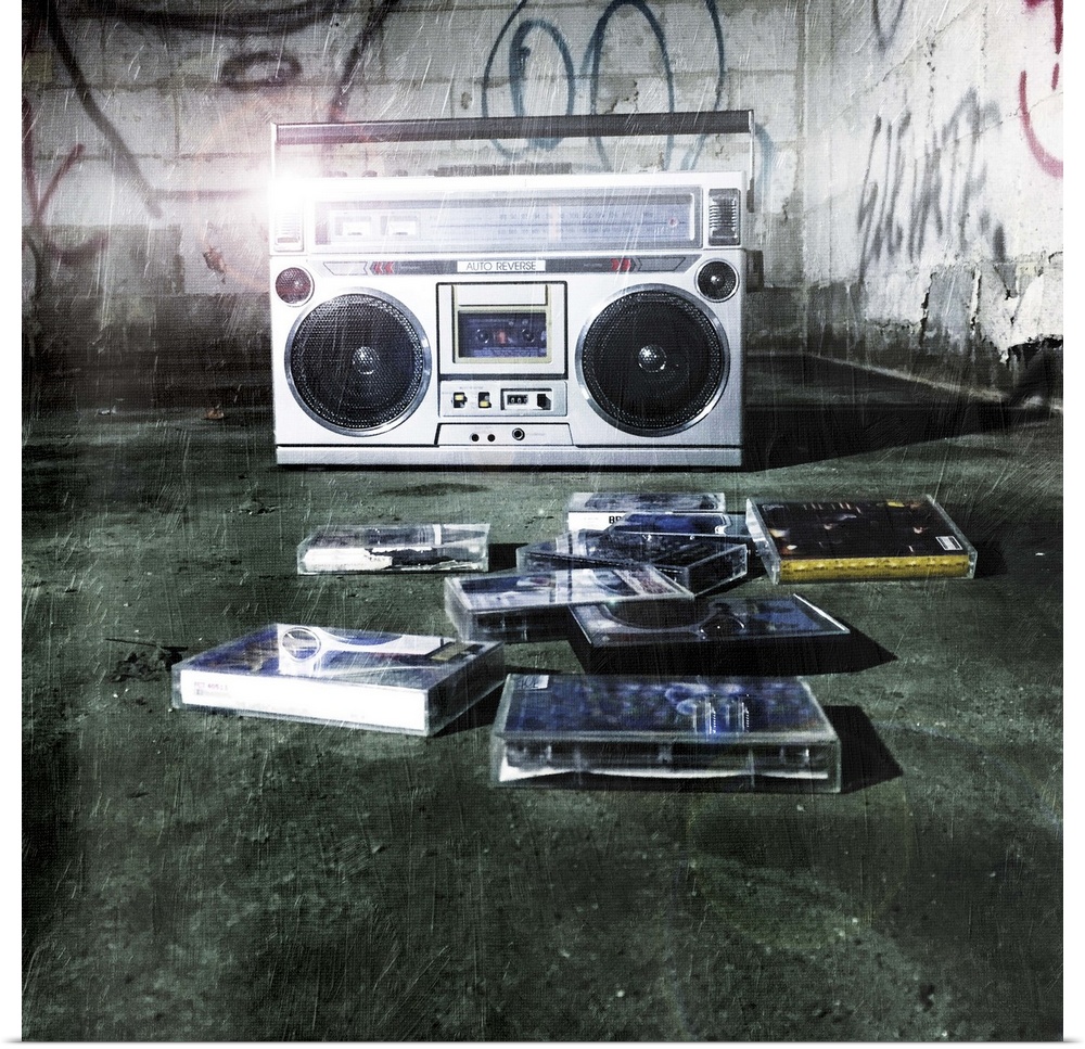 A classic boom box stereo sitting in an abandoned building with old cassette tapes.