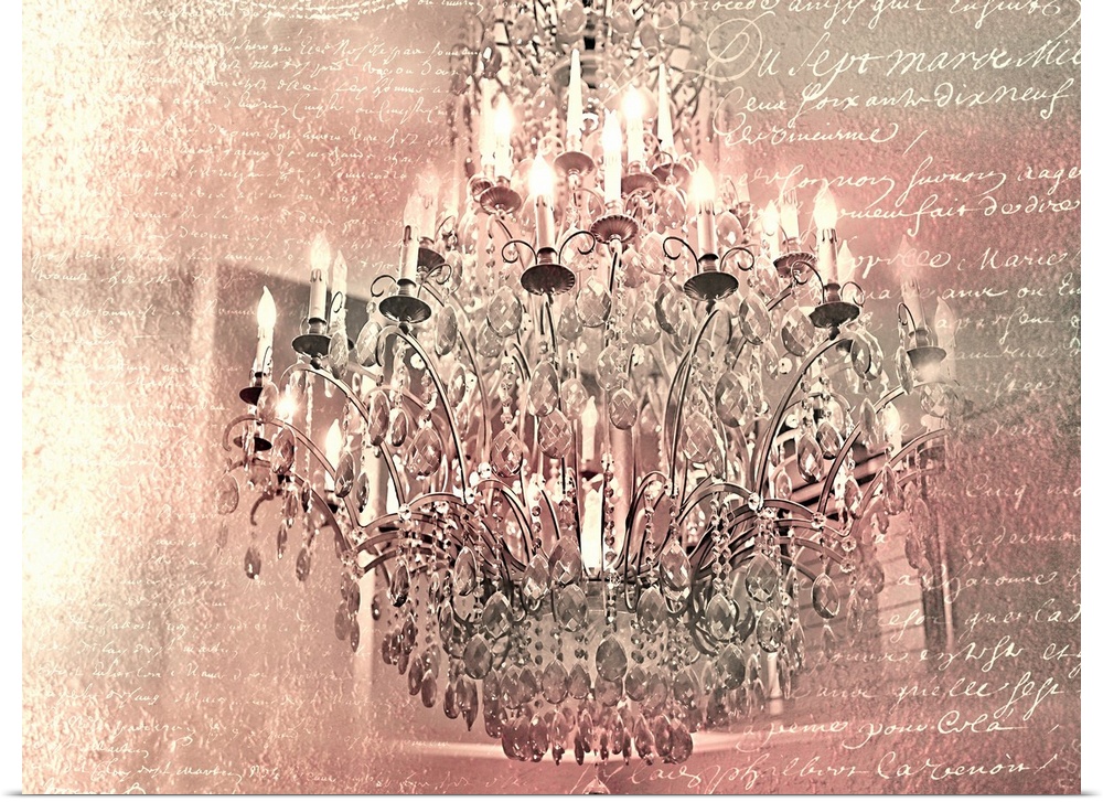 A chandelier on a pink toned background with white handwritten text