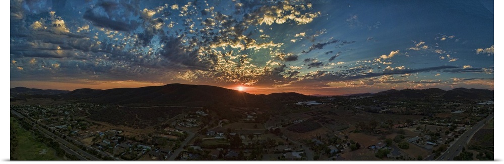 Sunset in San Marcos. This is a colorful aerial panoramic at sunset in this North county San Diego, Southern Caliornia town.
