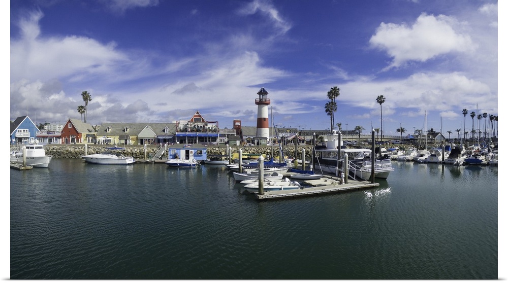 A cute village and lighthouse in Oceanside Harbor. Oceanside is 40 miles North of San Diego, California, USA.