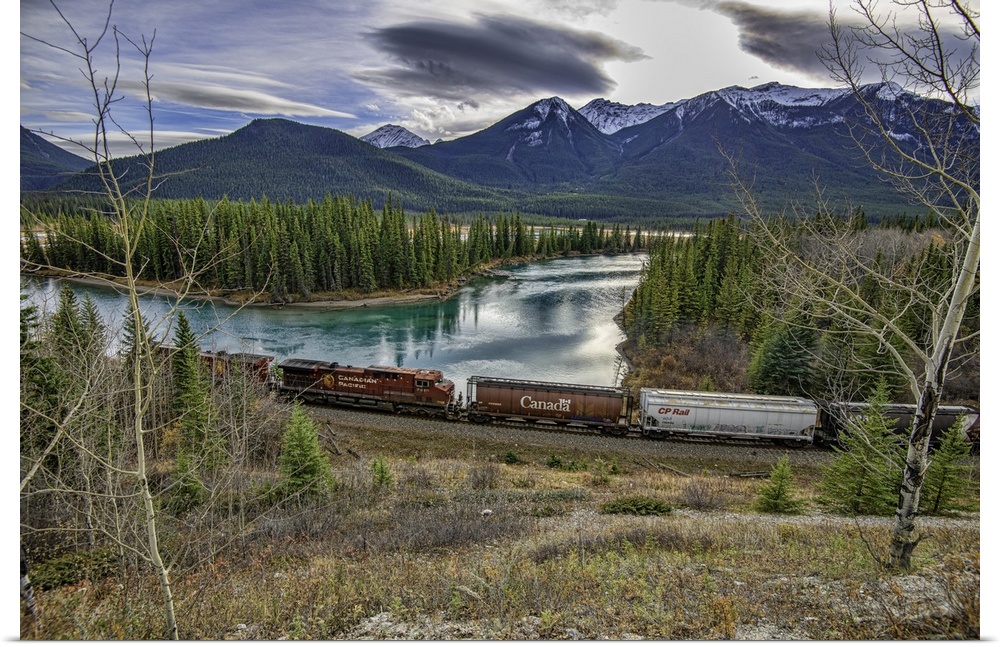 Train along river in Banff, Canada