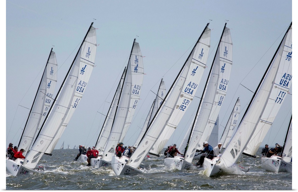 A fleet of J70 Sailboats during a race on the Chesapeake Bay near Annapolis, MD
