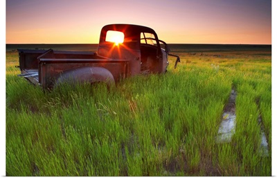 Abandoned Pick-Up Truck Sitting In A Field At Sunset, Southwestern Saskatchewan