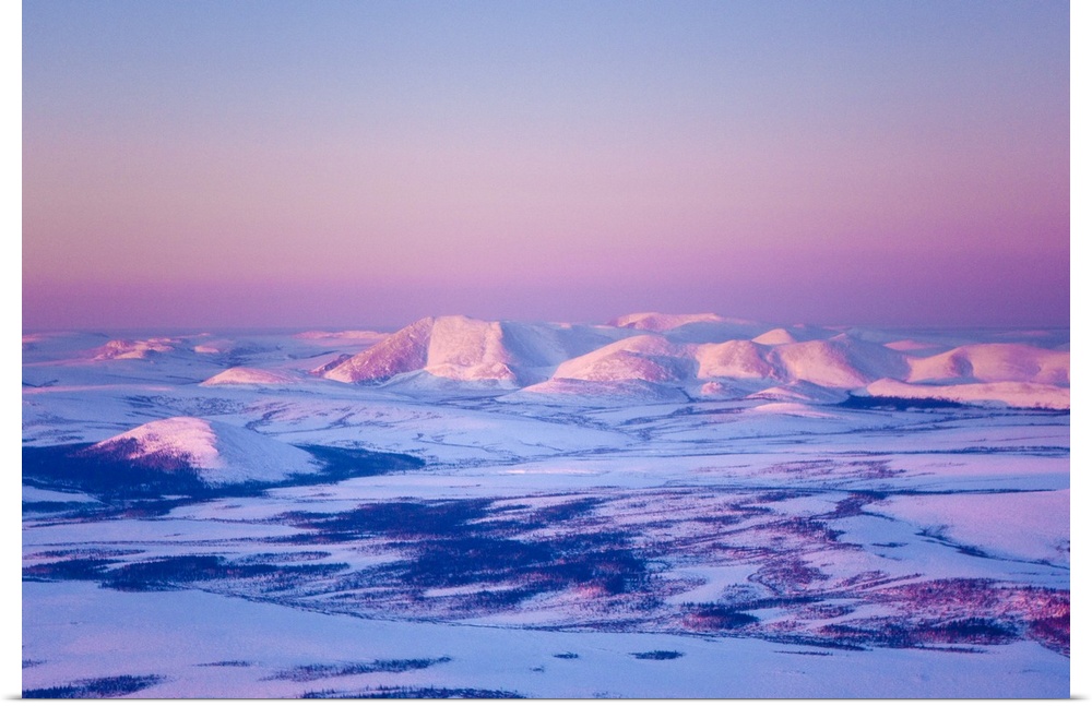 Aerial view of the Noatak River valley and the Baird Mountains just before sunset during Winter, Arctic Alaska