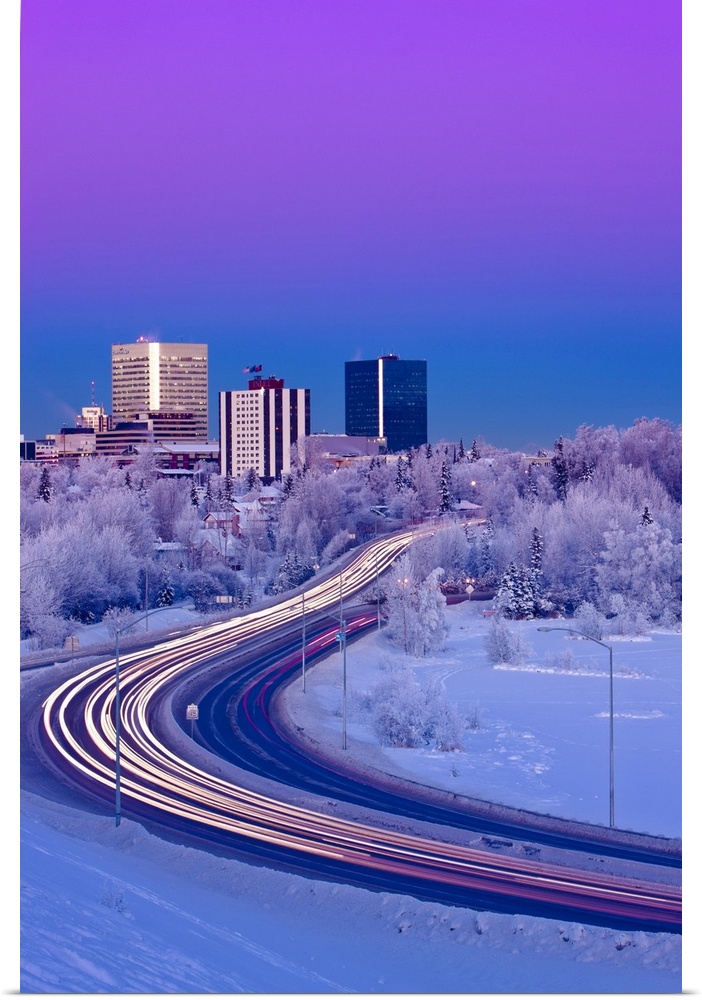 Alpenglow Over The Anchorage Skyline With The Lights From Traffic On Minnesota Blvd. In The Foreground During Winter, Sout...
