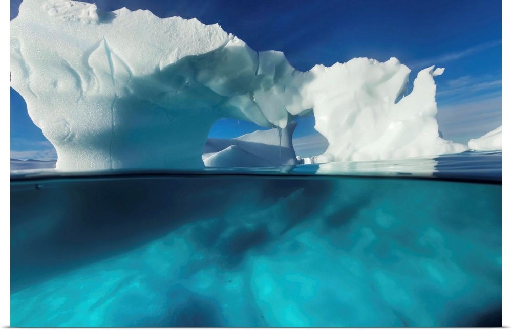 Antarctica, Underwater view of arched Iceberg floating near Enterprise Island on sunny spring morning along Antarctic Peni...