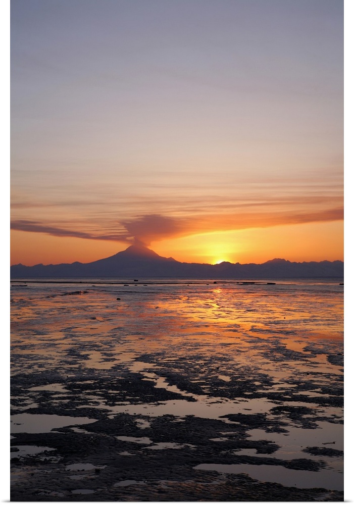 Ash Cloud Rises From Mt. Redoubt At Sunset During Low Tide Near Ninilchik, Alaska