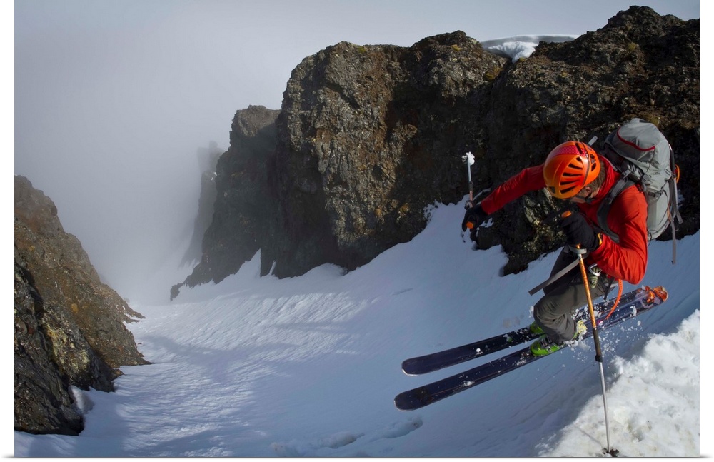 Backcountry skier on West Twin Peak near Eklutna, Western Chugach Mountains, Alaska, Winter.