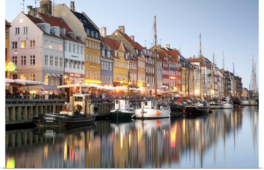 Boats and townhouses along the Nyhavn canal in Copenhagen.