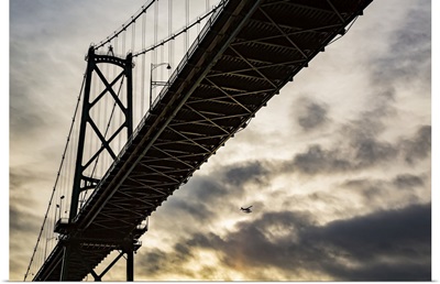 Bridge At Sunset With An Airplane Flying, Vancouver, British Columbia, Canada