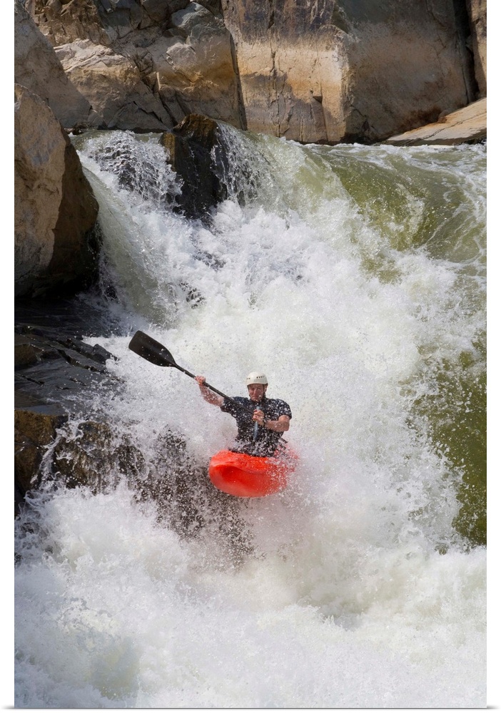 A C-1 paddler goes down the Spout on the Potomac River.