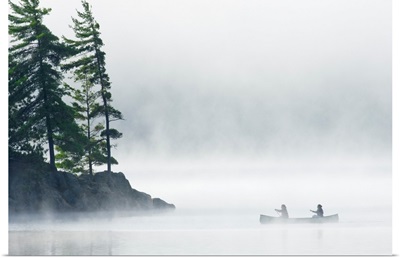 Canoeing Through Fog On Lake Of Two Rivers, Ontario, Canada