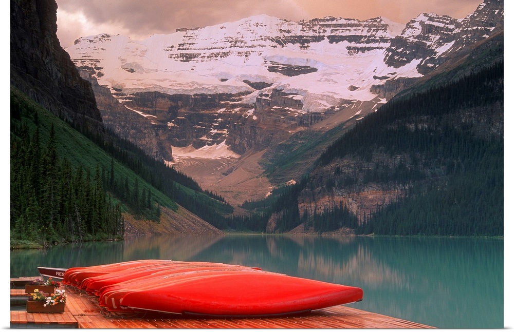 Canoes Lined On A Dock, Lake Louise, Banff National Park, Banff, Alberta, Canada