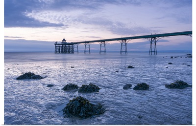 Clevedon Pier In The Severn Estuary At Low Tide After Sunset