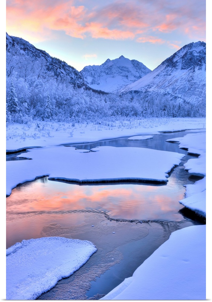 Colorful sunrise over a stream at the Eagle River Nature Center in Chugach State Park, Southcentral Alaska, Winter, HDR