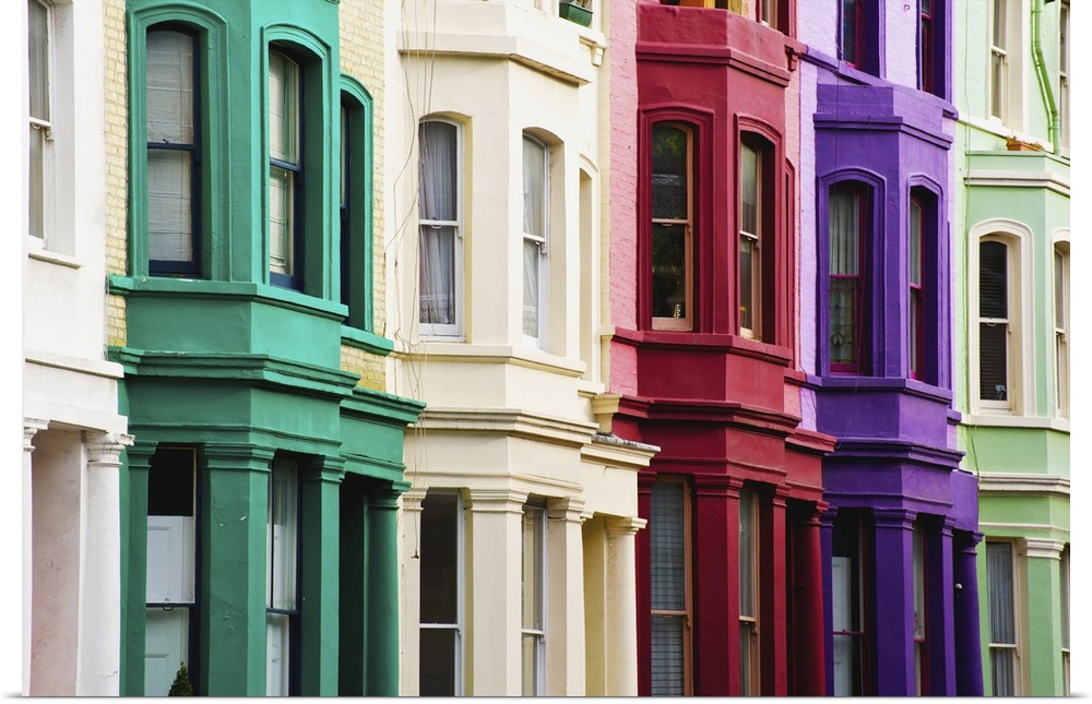 Colourful residential buildings in a row, Notting Hill, London, England