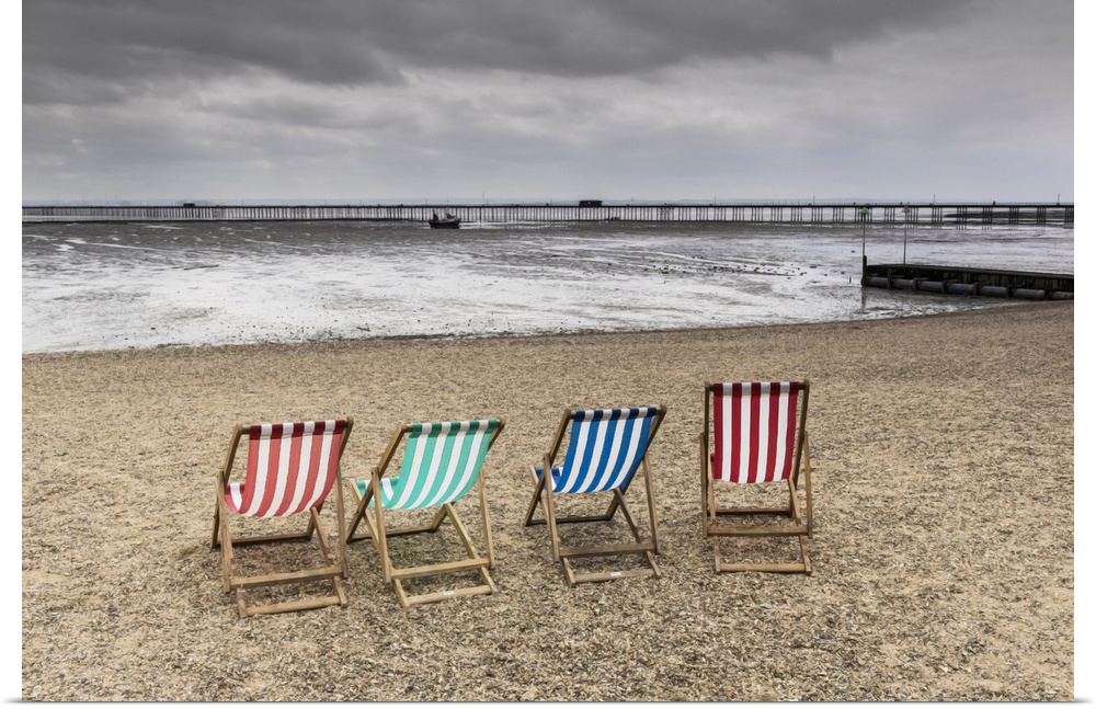 Empty deckchairs on Jubilee Beach in Southend on a cloudy day.