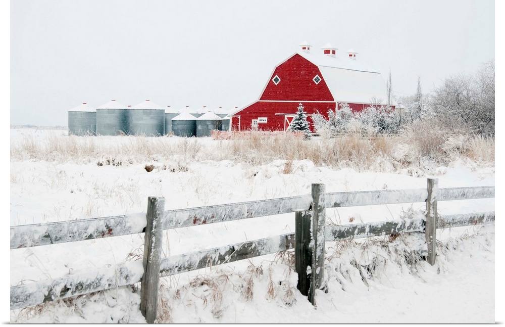 Farm Yard With A Red Barn And Metal Grain Bins In Winter, Alberta, Canada