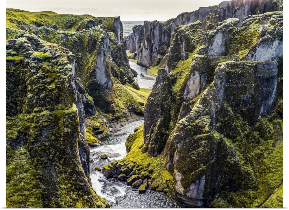 Fjadrargljufur is a magnificent and massive canyon, about 100 meters deep and about two kilometres long. The canyon has sh...