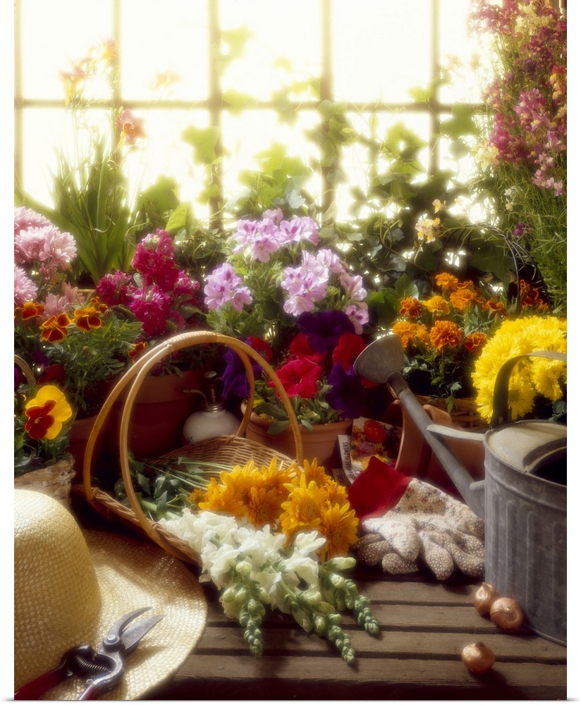 Gardener's workbench with various flowers.
