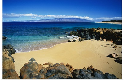 Hawaii, Lanai, Polihua Beach; Footprints In Sand, Rocks Around Beach