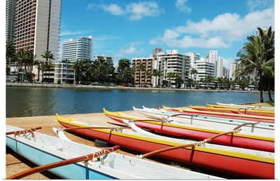 Hawaii, Oahu, Honolulu, Lineup Of Colorful Outrigger Canoes Next To Ala Wai Canal