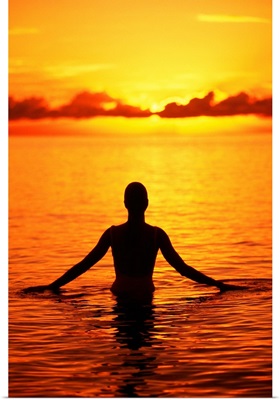 Hawaii, Oahu, Lanikai Beach, Silhouette Of Woman Wading In The Ocean At Sunrise